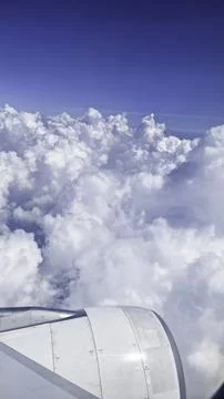 View of clouds from the airplane window Stock Photos