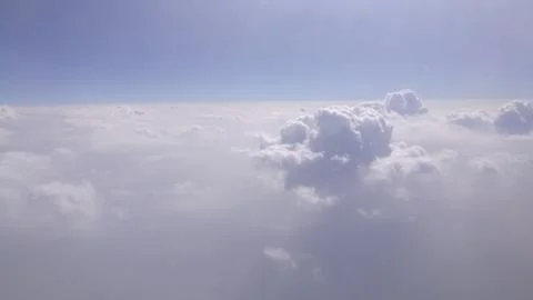 A view of clouds from airplane's window. Stock Photos
