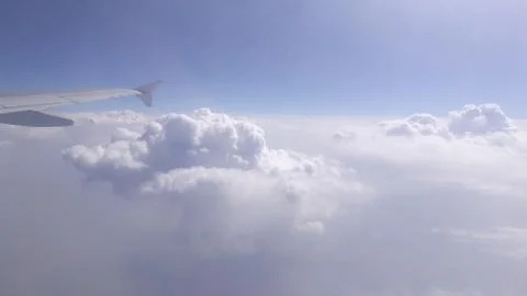 A view of clouds from airplane's window. Stock Photos