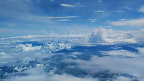 View of clouds and blue sky from plane Stock Footage 287068461