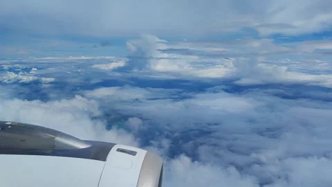 View of clouds and blue sky from plane Stock Footage 287068648