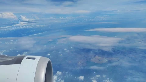 View of clouds and blue sky from plane Stock Footage 287068729