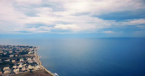 View of the clouds and city from an airplane, travel and holiday Stock Footage 142581091