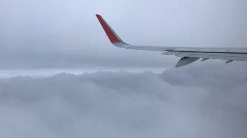 View of Clouds and Planes From a Journey Over Athens Shore Stock Footage 317337824
