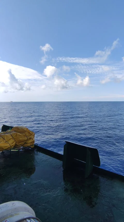 The view of the clouds and the sea from aboard the ship. Stock Footage 311489852