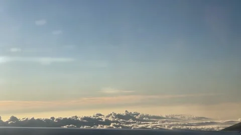 View of Clouds and Sky from Plane Window Видео 214220064
