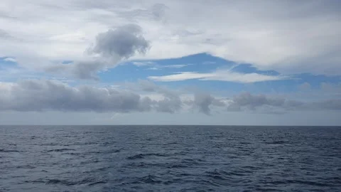 View of clouds and waves in the ocean Stock Footage 297137618