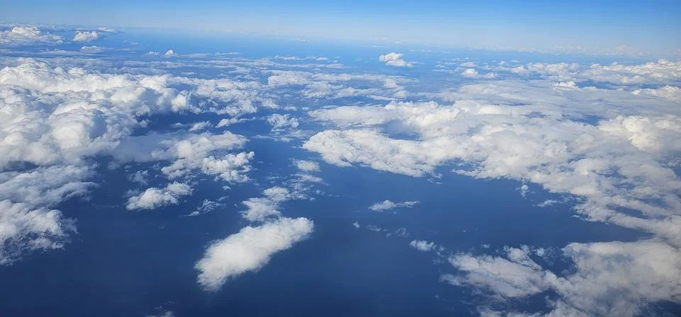 A view of clouds clouds clouds from a Aeroplane during vacation Stock Photos