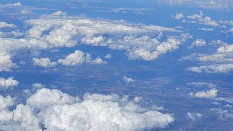 A view of clouds during flight for vacation Stock Photos