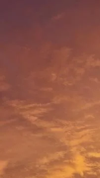 View of clouds in a orange red sunset 写真素材