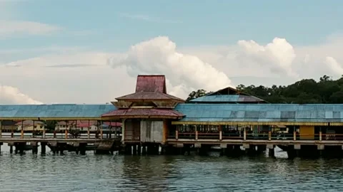 View of the clouds over the pier of Penyengat Island, Indonesia Stock Footage 221138736