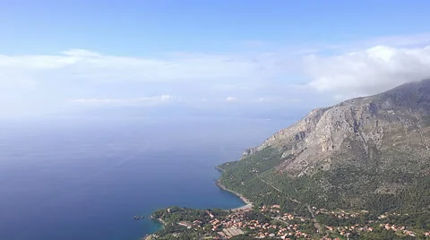 View Of Clouds Over the Sea Bay Mountains On the Coast Video stock 56914028