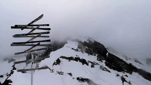 View of clouds over the top of the mountain Stock Footage 109337910