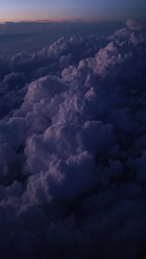 View on clouds from a plane on sunset Stock Footage 280499360