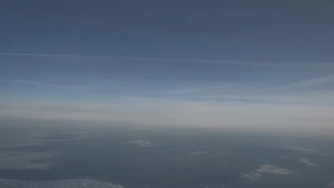 View of the clouds from the porthole Vidéo 168906737