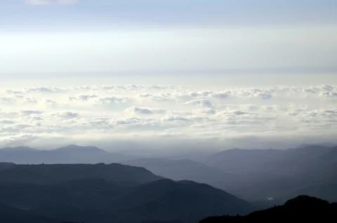 View of the clouds from the top of the mountain Stock Photos