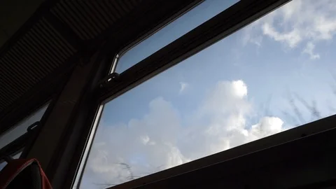 View of the clouds from the train window Stockbeeldmateriaal 89134586