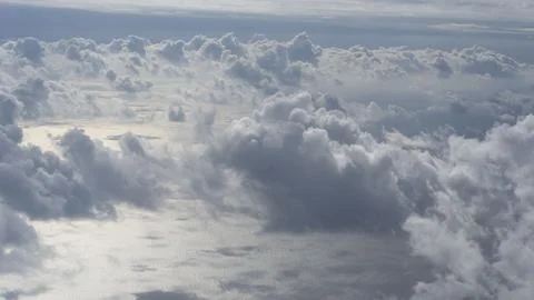 View of the clouds from the window of an airplane Stock Photos