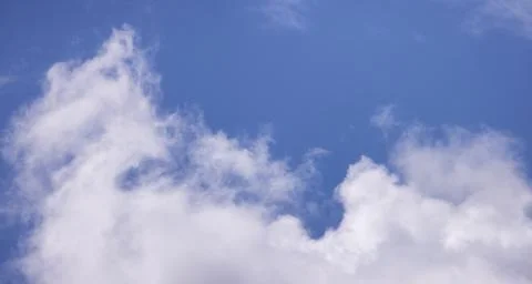 View of Cloudscape during a cloudy blue sky sunny day. Stock-Fotos