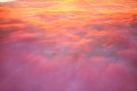 View of the cloudscape. View of the cloudscape from the plane window at su... 스톡 사진
