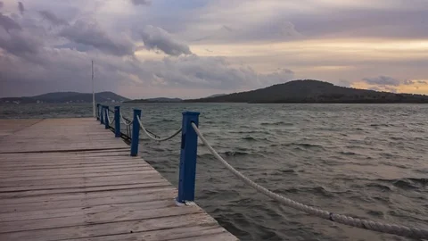 View of a cloudy late afternoon from the pier Stock Footage 100306670