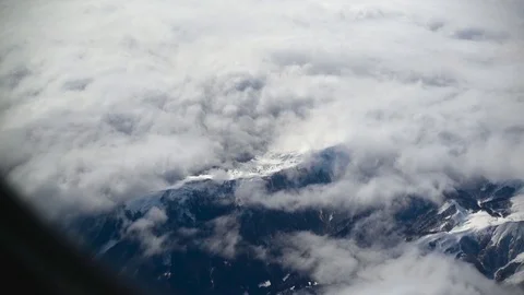 View of cloudy mountains, airplane shot Video stock 89551847