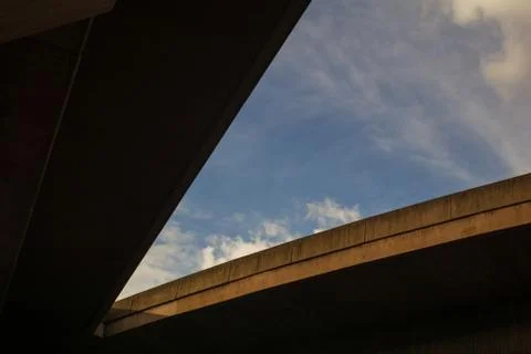 View to a cloudy sky and a part of a bridge Foto stock