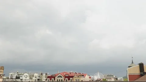 View of cloudy sky over city buildings showing architectural beauty and weather Stock Footage 315898218
