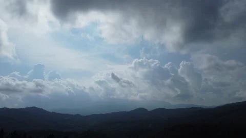 View cloudy sky over the forest with moving clouds Stock Footage 160855617