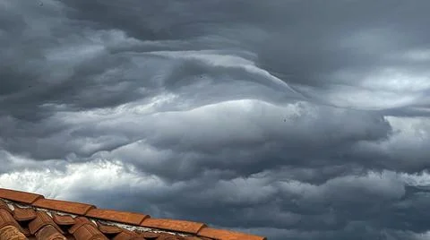 View of the cloudy sky before the storm, from the rooftops of Venice Stock Photos