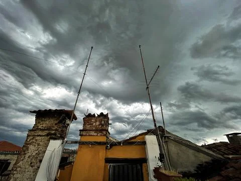 View of the cloudy sky before the storm, from the rooftops of Venice Stock Photos