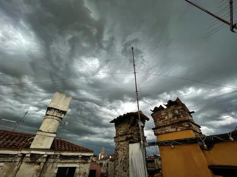 View of the cloudy sky before the storm, from the rooftops of Venice Stock Photos
