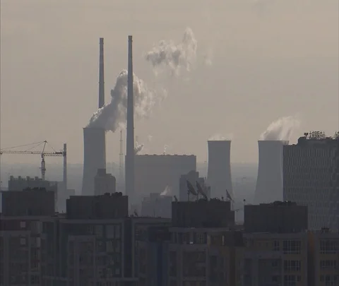 View of coal burning power plant through smog and haze Stock Footage 86745046