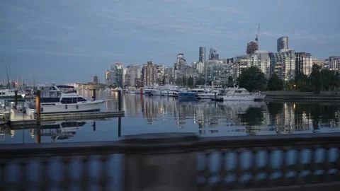 View of Coal Harbour Marina and Vancouver City Skyline at Dusk Stock Footage 342371876