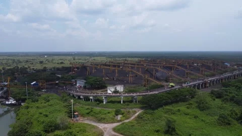 View of the coal terminal air with the activities of coal, barge and coal c.. Stock Footage 293116849