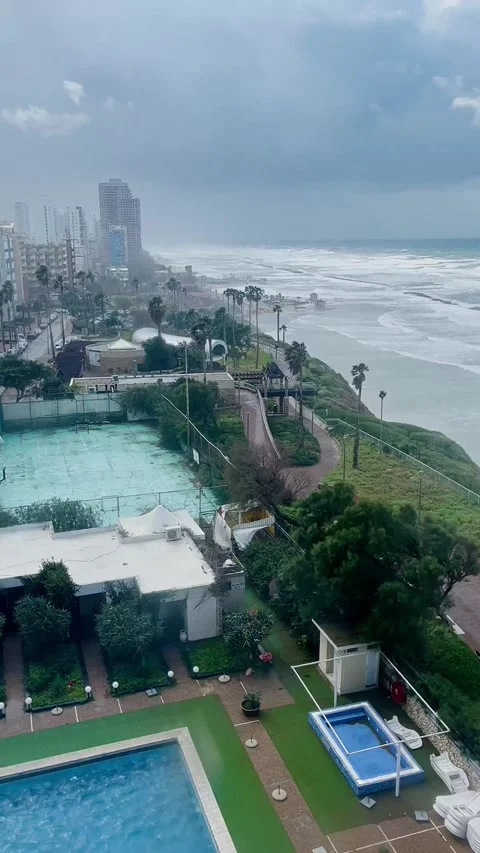 A view of the coast and the sea from the window of a hotel in Netanya, Israel. Stock Footage 237596789