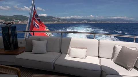 View of the coast from the back of a yacht  Stock Footage 111652508