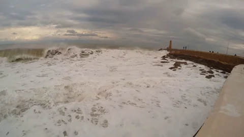 View From Coast Big Waves Foam and Splashes on Background Ancient Pier and Stock Footage 74459582