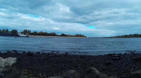 View the coast of the calm river with tidal waves penestae Stock Footage 68616638