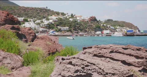 View from the coast of Panarea of the islets Basiluzzo and Dattilo. A seagull 스톡 동영상 165552326