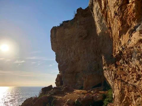 View to the coast at sunset Stock Photos