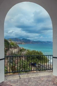 View of the coast through arch Stock Photos