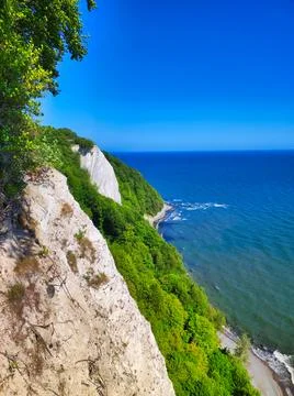 View of a coastal area showing cliffs and ocean on a clear day Stock Photos