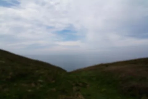 View from the coastal path between Widemouth Bay and Bude Out of focus. Stock Photos