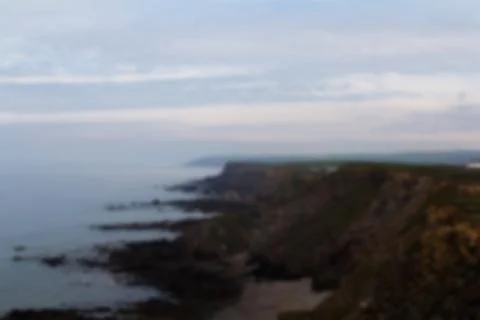View from the coastal path between Widemouth Bay and Bude Out of focus. Stock Photos