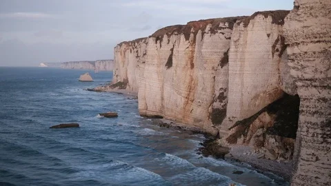 View of the coastline and chalk cliffs of Etretat, France Stock Footage 119055301