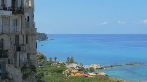 View of the coastline and surrounded by crystal clear water in summer Stock Footage 67813754