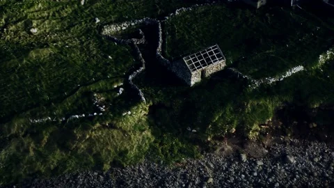 View on a coastline on Faroe Islands at sunset Video stock 129868013