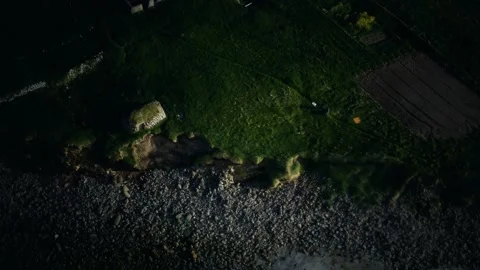 View on a coastline on Faroe Islands at sunset Stock Footage 141674604