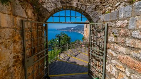 View of Coastline Through Castle Gate Stock Photos